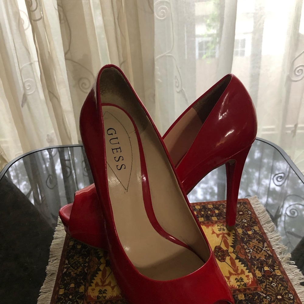 Red patent leather, peep-toe platforms. Size 8.